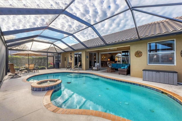 view of pool with an in ground hot tub, an outdoor hangout area, a patio area, and a lanai