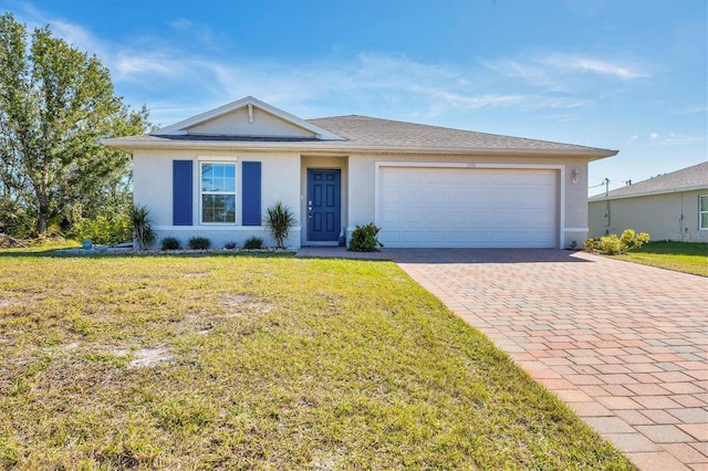 ranch-style house with a garage and a front yard