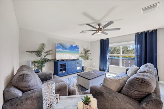 living room with ceiling fan