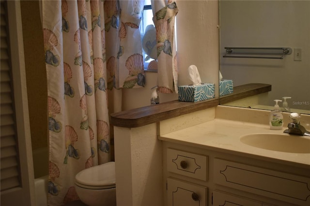 full bathroom featuring vanity, toilet, and shower / bathtub combination with curtain