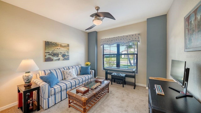 carpeted living room featuring ceiling fan