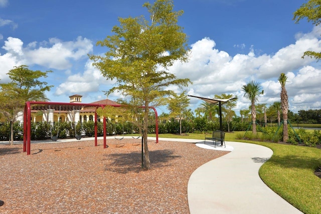 view of property's community with a gazebo, a yard, and a playground