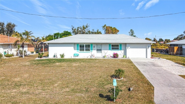 single story home with a garage and a front yard