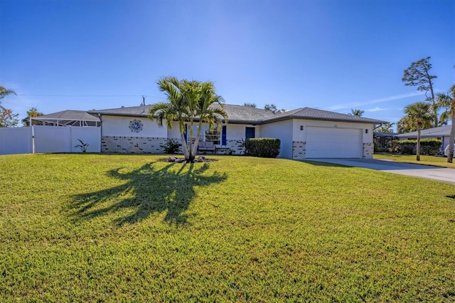 ranch-style home featuring a garage and a front lawn