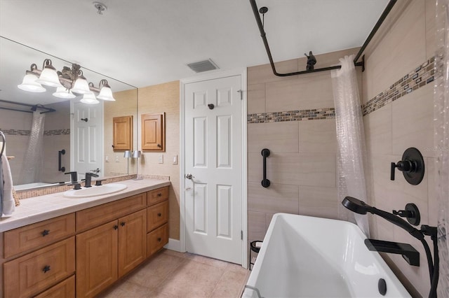 bathroom with vanity and tile patterned floors