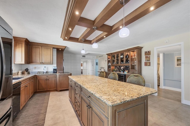 kitchen featuring hanging light fixtures, black dishwasher, coffered ceiling, a kitchen island, and beverage cooler