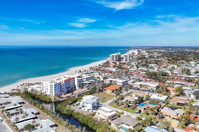 drone / aerial view with a view of the beach and a water view