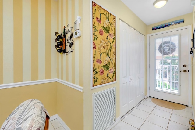 entryway featuring light tile patterned floors