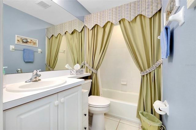 full bathroom with vanity, toilet, tile patterned flooring, and shower / tub combo