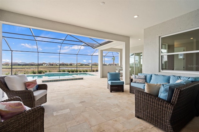 view of patio / terrace with outdoor lounge area and a lanai