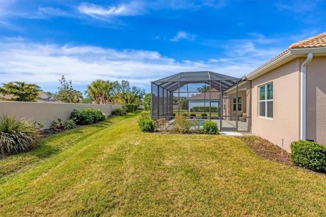 view of yard with a lanai