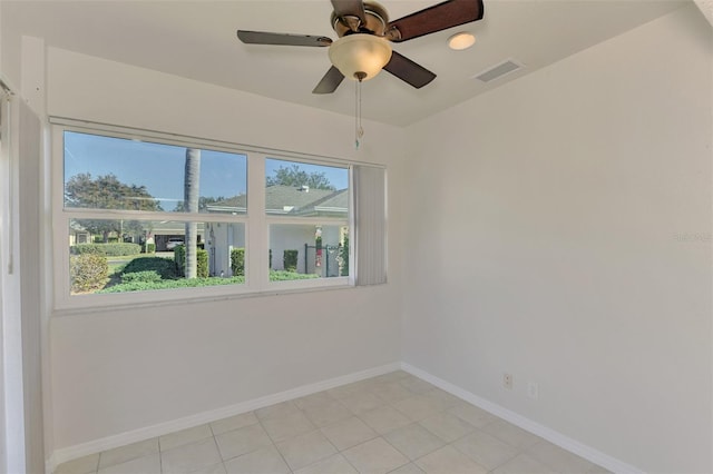 spare room featuring ceiling fan