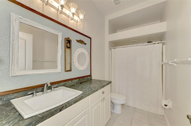 bathroom featuring vanity, toilet, curtained shower, and tile patterned flooring