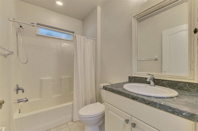 full bathroom with vanity, shower / bathtub combination with curtain, tile patterned floors, and toilet