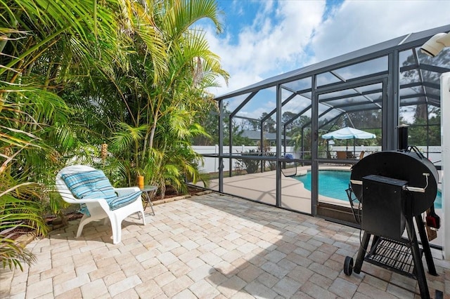 view of patio with a fenced in pool and a lanai