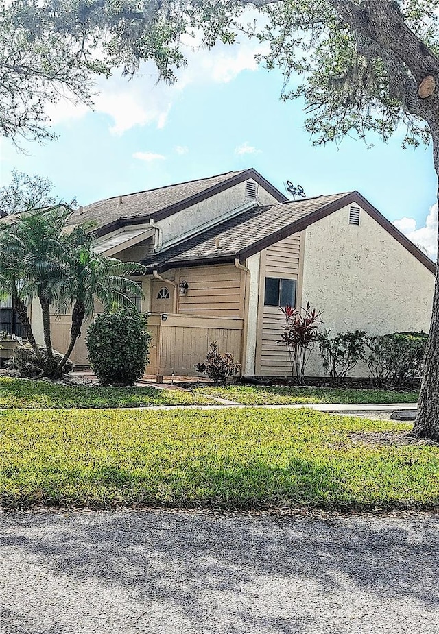 exterior space with a yard