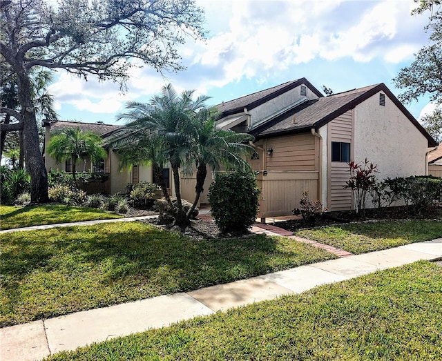 view of front of home with a front yard