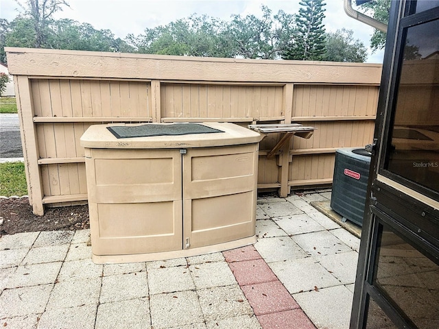 view of patio with central AC unit