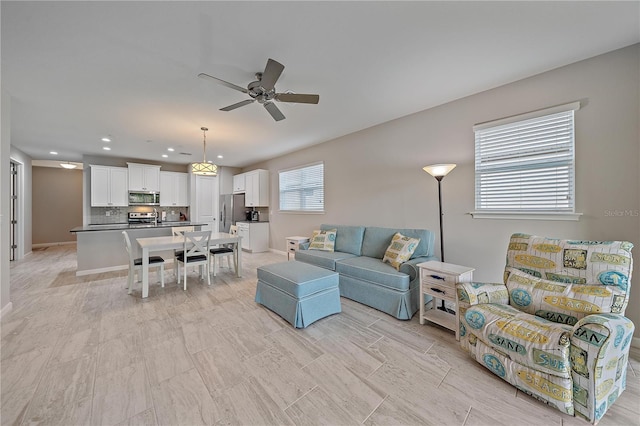 living room with ceiling fan