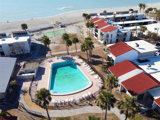 aerial view featuring a view of the beach and a water view