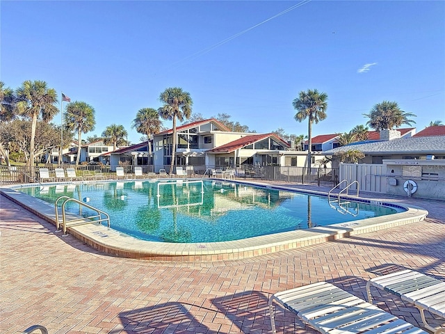 view of swimming pool featuring a patio