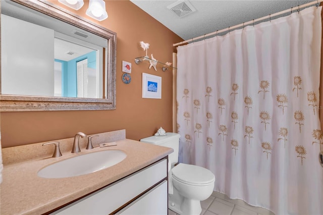 bathroom with tile patterned flooring, vanity, toilet, a textured ceiling, and a shower with shower curtain