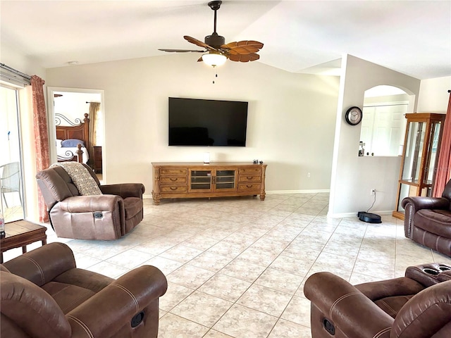 tiled living room with vaulted ceiling and ceiling fan