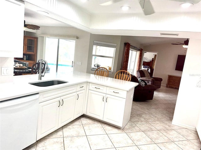 kitchen with sink, white cabinetry, kitchen peninsula, dishwasher, and ceiling fan