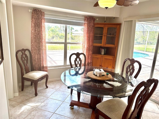 dining space with light tile patterned floors