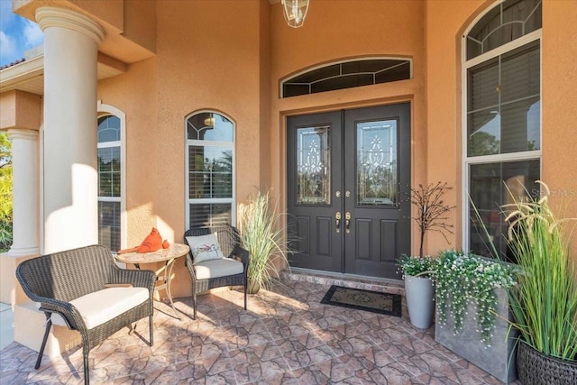 doorway to property featuring french doors