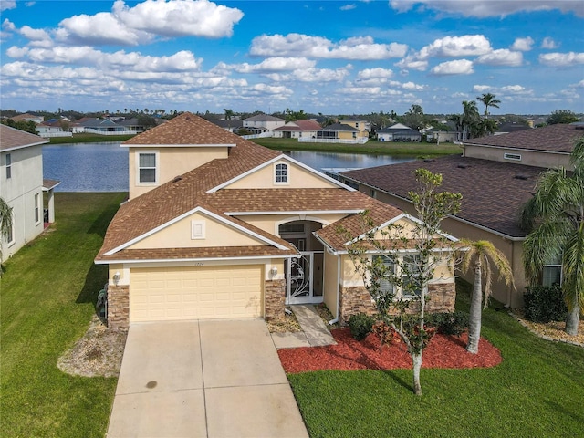 view of front of home featuring a garage, a residential view, a front lawn, and concrete driveway