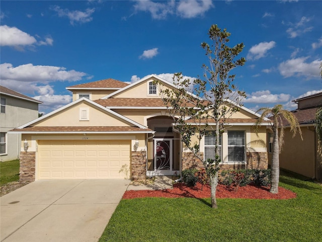 view of front of property with a garage, stone siding, a front lawn, and stucco siding