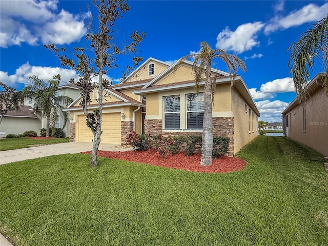 view of front of property with stucco siding, concrete driveway, an attached garage, a front yard, and stone siding