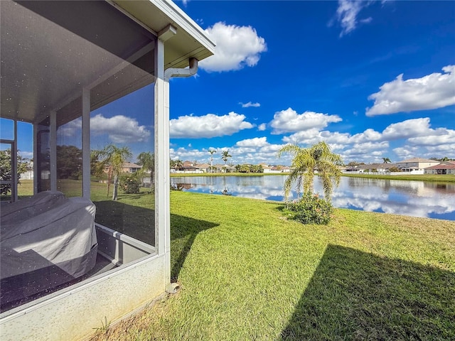 view of yard with a water view