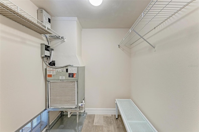 spacious closet featuring wood-type flooring