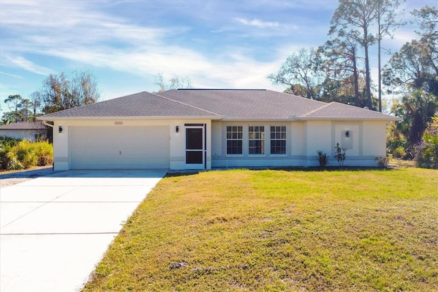 ranch-style house with a garage and a front lawn