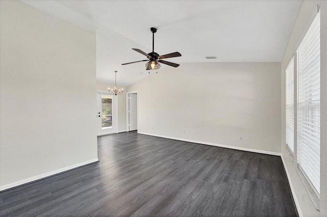 unfurnished living room featuring lofted ceiling, dark hardwood / wood-style floors, and ceiling fan with notable chandelier