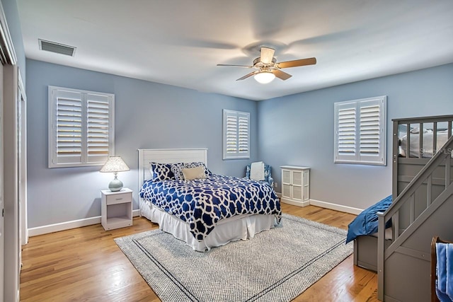 bedroom featuring ceiling fan and light wood-type flooring