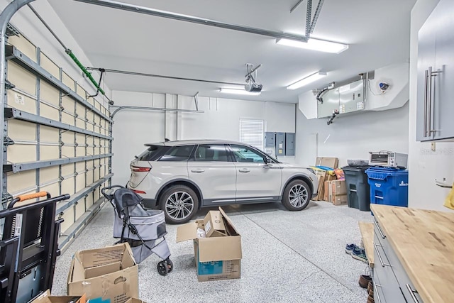 garage featuring a garage door opener