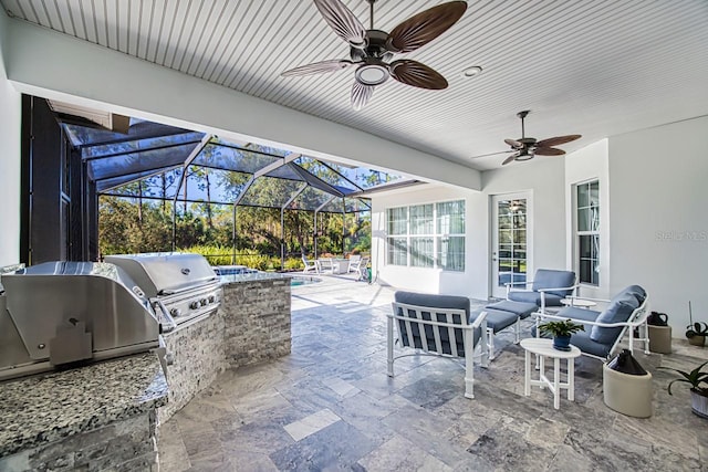 view of patio with an outdoor kitchen and grilling area