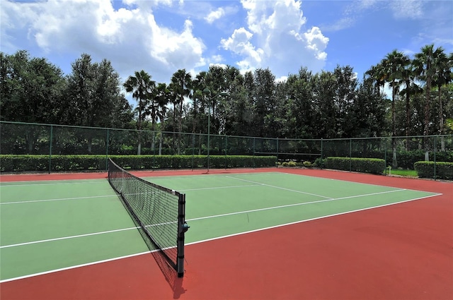 view of sport court featuring basketball hoop