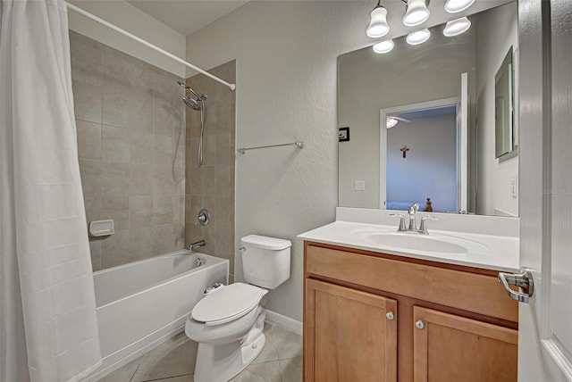 full bathroom featuring shower / tub combo with curtain, vanity, tile patterned floors, and toilet