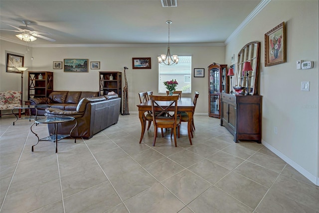 dining space with light tile patterned floors, crown molding, and ceiling fan with notable chandelier