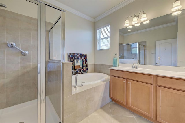 bathroom with vanity, crown molding, tile patterned floors, and shower with separate bathtub