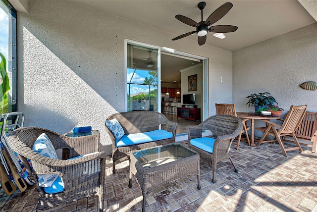 view of patio with ceiling fan