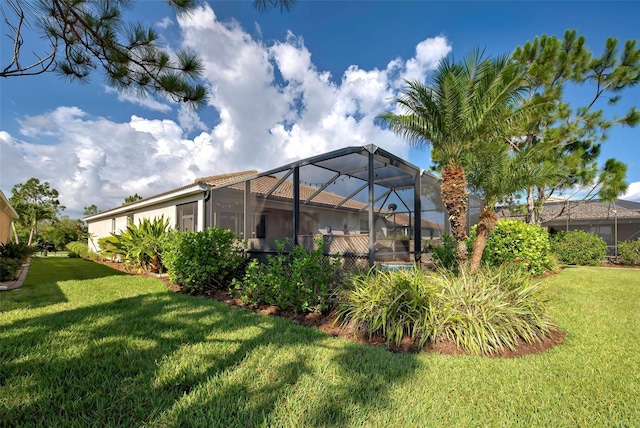 view of yard featuring a lanai