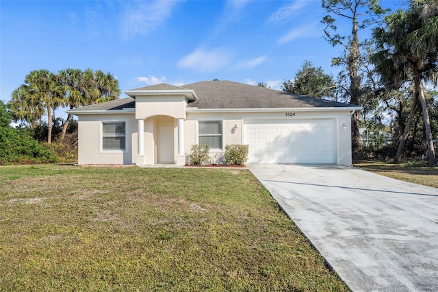 view of front facade with a garage and a front yard