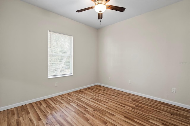 unfurnished room featuring ceiling fan and light wood-type flooring