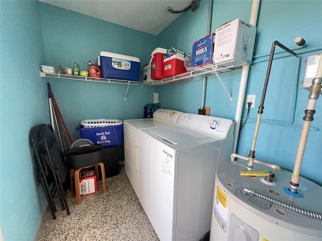 laundry room with laundry area, water heater, and washer and clothes dryer