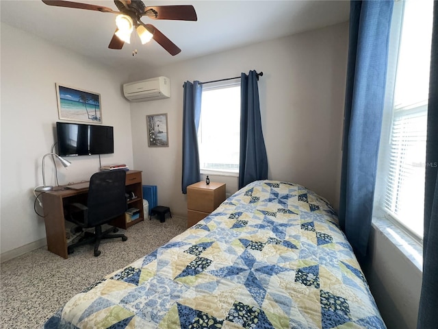 bedroom with a wall unit AC and ceiling fan